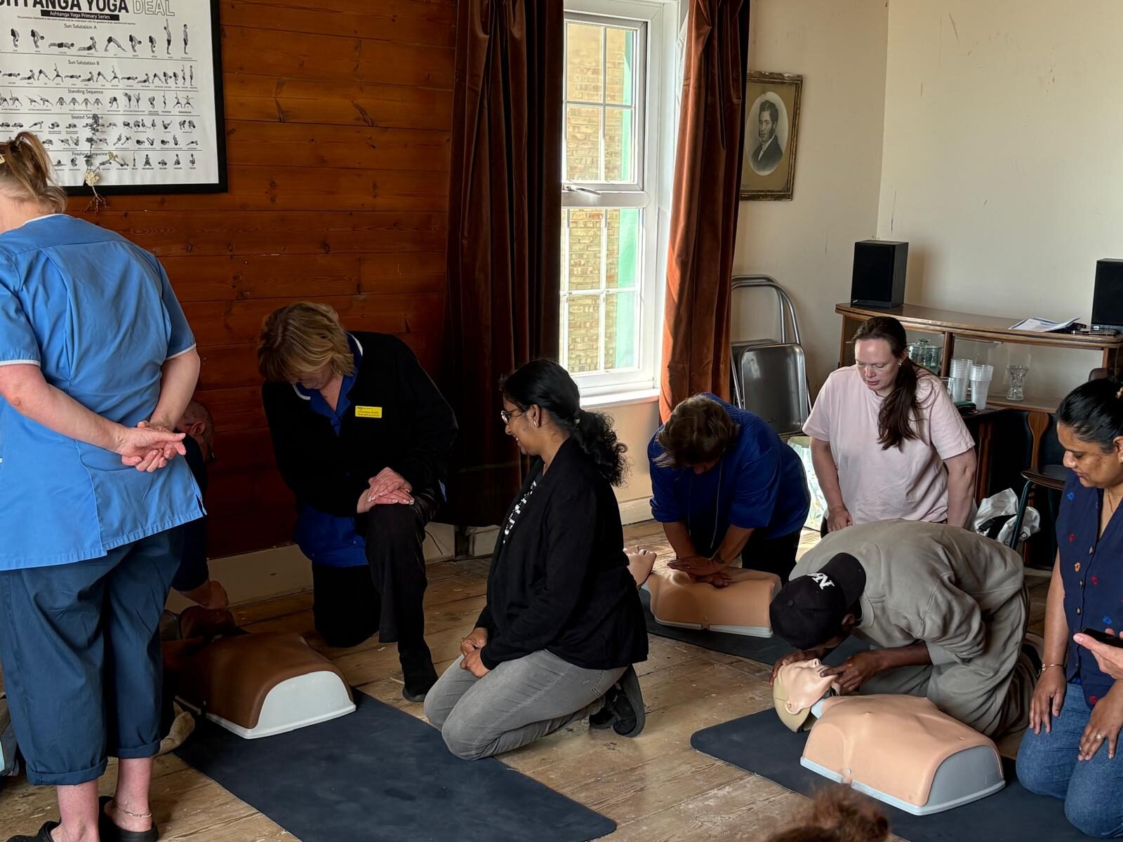St Anselm's team practising CPR on manikins during on-site resuscitation training