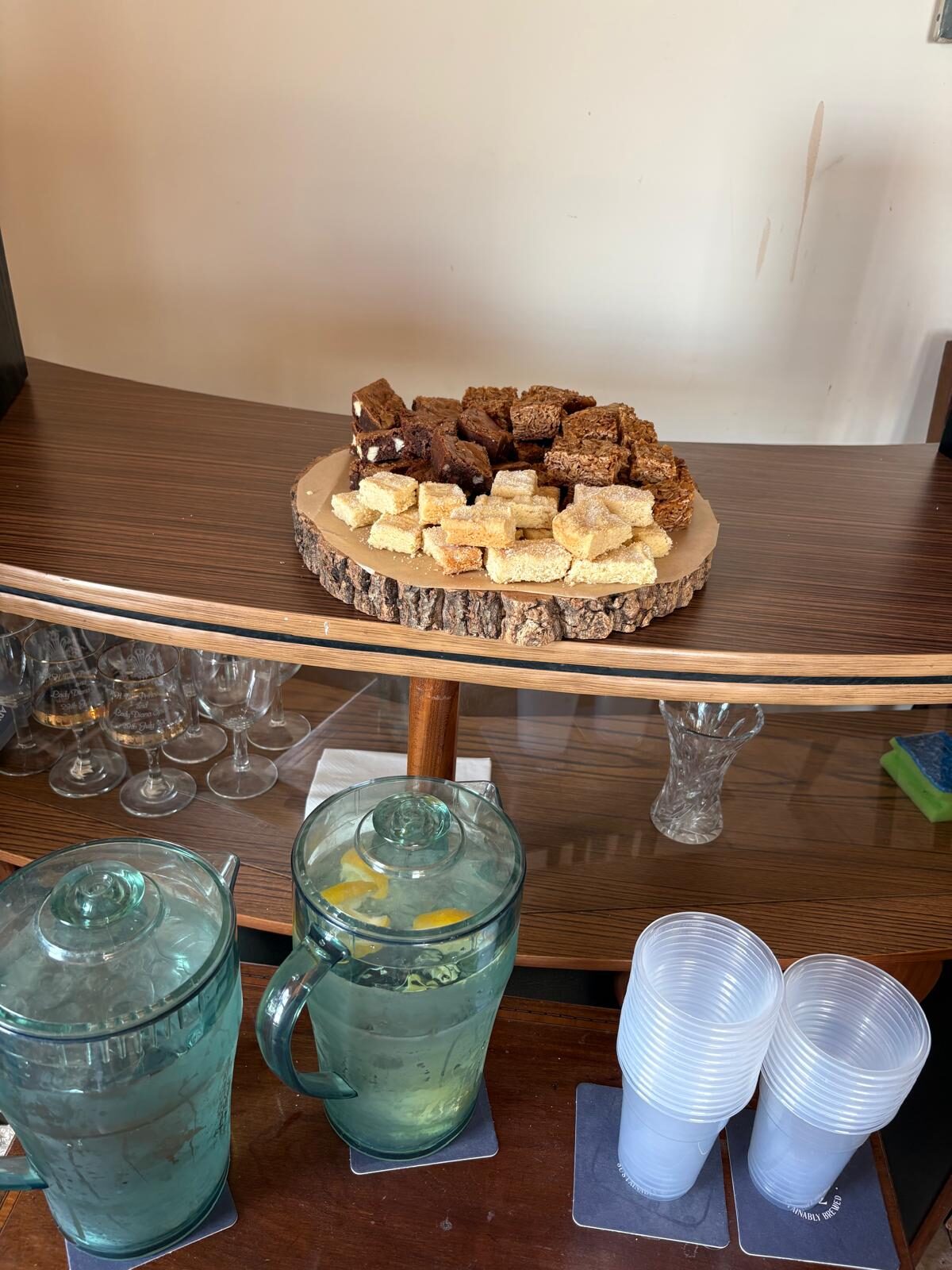 Staff sharing tea and homemade cakes together at St Anselm's
